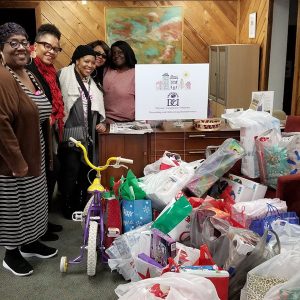 Donor’s drop off holiday gifts for the children residing in Hagar’s House